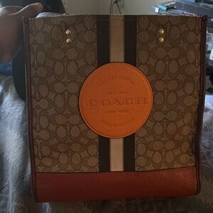 Coach Brown and Tan Dempsey bag
